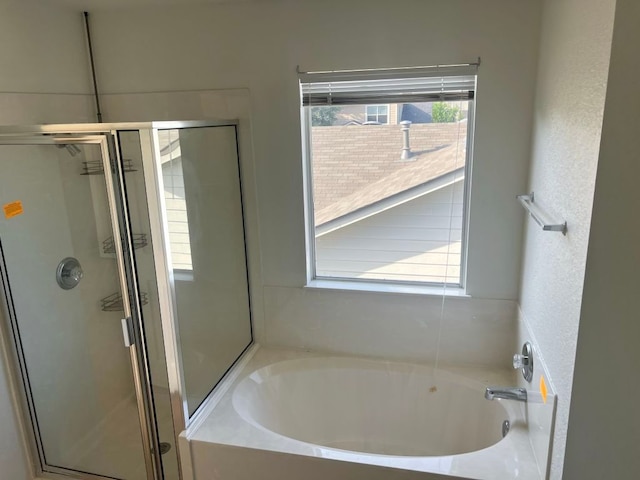15316 Lady Elizabeth Ln, Pflugerville, TX 78660 - bathroom featuring a stall shower and a garden tub