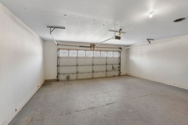 3419 Bluebonnet Trl, Georgetown, TX 78628 - garage with a garage door opener and baseboards