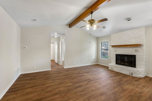3419 Bluebonnet Trl, Georgetown, TX 78628 - unfurnished living room featuring a ceiling fan, dark wood-style flooring, and a fireplace