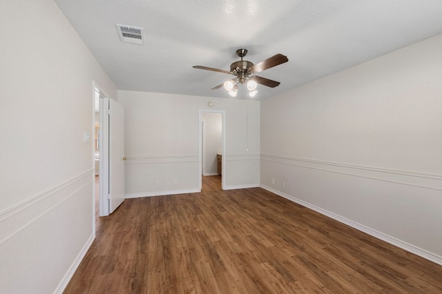 3419 Bluebonnet Trl, Georgetown, TX 78628 - spare room featuring wood finished floors and ceiling fan