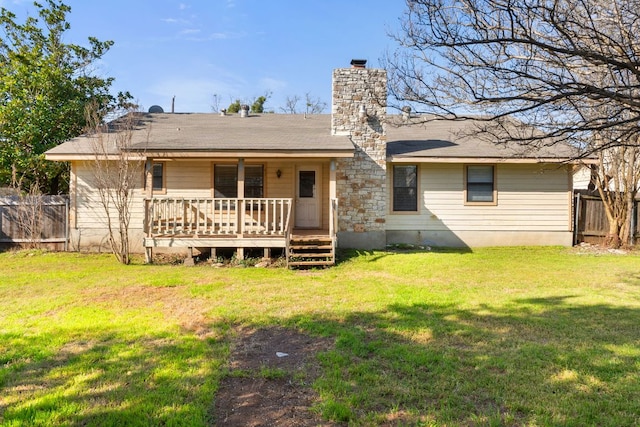 3419 Bluebonnet Trl, Georgetown, TX 78628 - back of house with a chimney, a shingled roof, and a deck