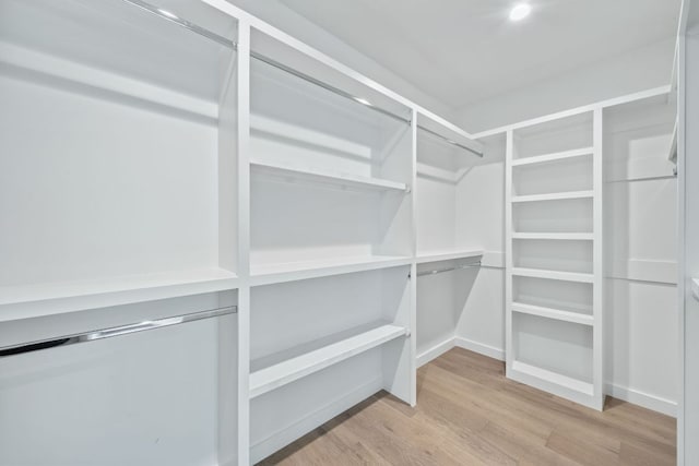 2309 E 5th St, Austin, TX 78702 - spacious closet with wood finished floors