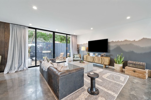 2309 E 5th St, Austin, TX 78702 - living area with floor to ceiling windows, finished concrete flooring, and recessed lighting