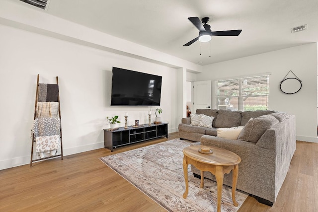 413 Luna Vista Dr, Hutto, TX 78634 - living area featuring a ceiling fan and light wood-style flooring