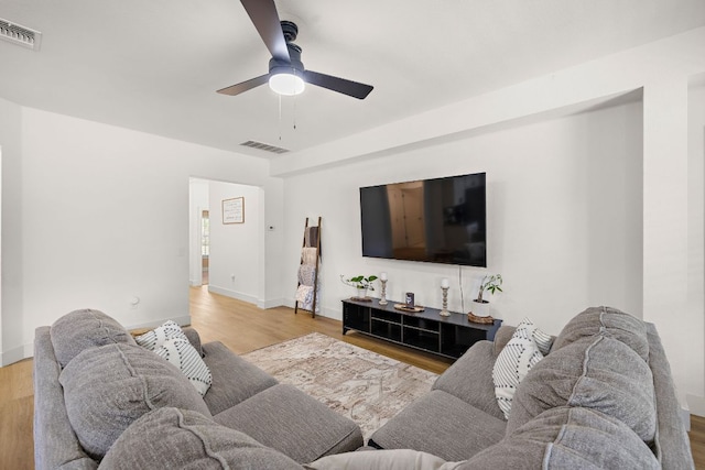 413 Luna Vista Dr, Hutto, TX 78634 - living room with a ceiling fan and wood finished floors
