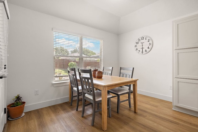 413 Luna Vista Dr, Hutto, TX 78634 - dining area featuring healthy amount of natural light, light wood-type flooring, and vaulted ceiling