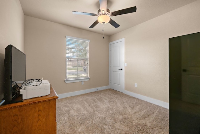 413 Luna Vista Dr, Hutto, TX 78634 - carpeted home office featuring ceiling fan and baseboards