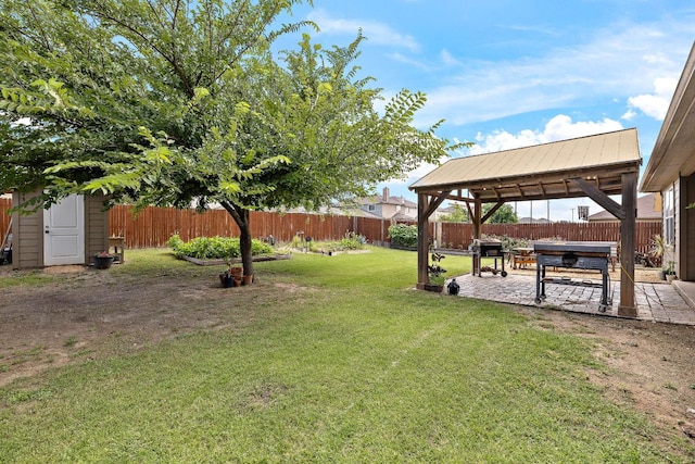 413 Luna Vista Dr, Hutto, TX 78634 - fenced backyard with a gazebo, a patio area, and a shed