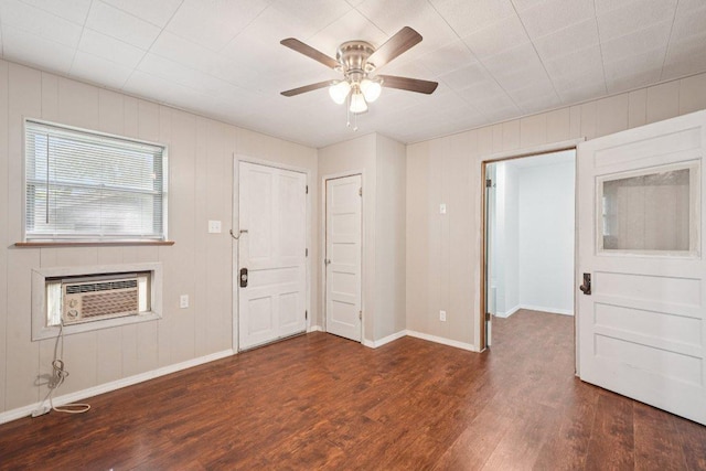 1620 Cavett St, Gonzales, TX 78629 - foyer entrance featuring wood finished floors, a ceiling fan, and an AC wall unit