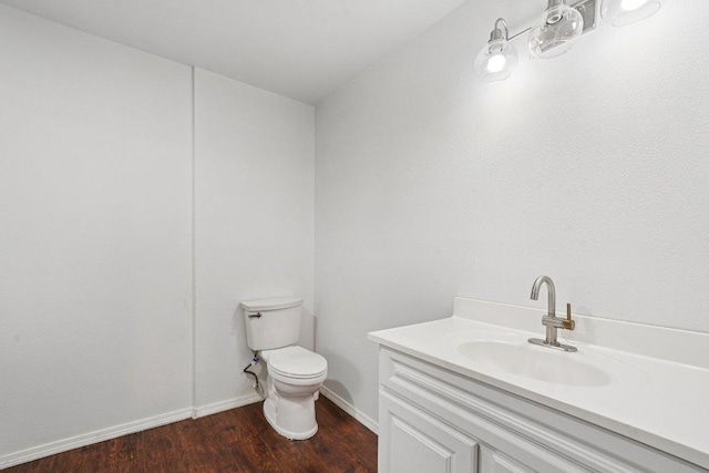 1620 Cavett St, Gonzales, TX 78629 - bathroom featuring wood finished floors and vanity