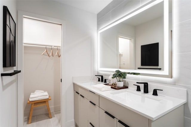 1908 Albury Cv Unit B, Austin, TX 78758 - bathroom with double vanity and a walk in closet