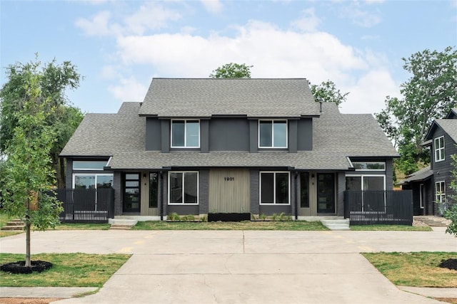 1908 Albury Cv Unit B, Austin, TX 78758 - view of front of home featuring roof with shingles and concrete driveway