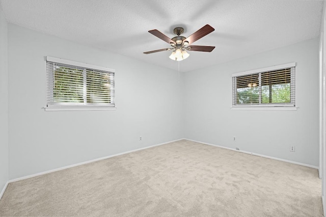 4800 Lansing Dr, Austin, TX 78745 - spare room with plenty of natural light, a textured ceiling, and carpet floors