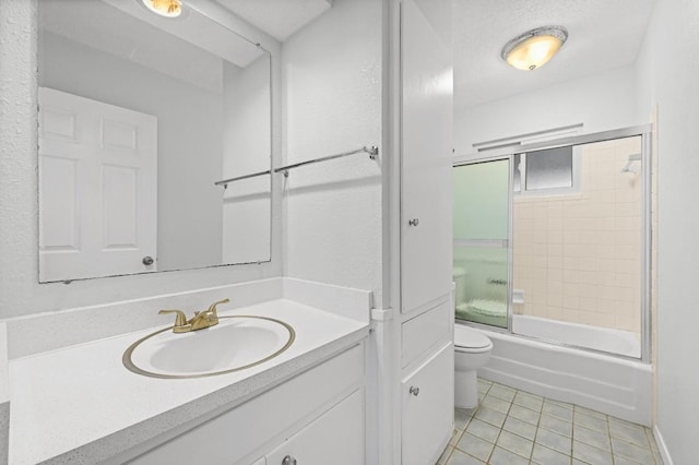 4800 Lansing Dr, Austin, TX 78745 - full bathroom with tile patterned floors, vanity, and combined bath / shower with glass door