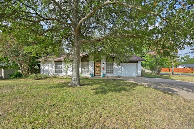 4800 Lansing Dr, Austin, TX 78745 - view of front of property featuring a front yard, driveway, and an attached garage
