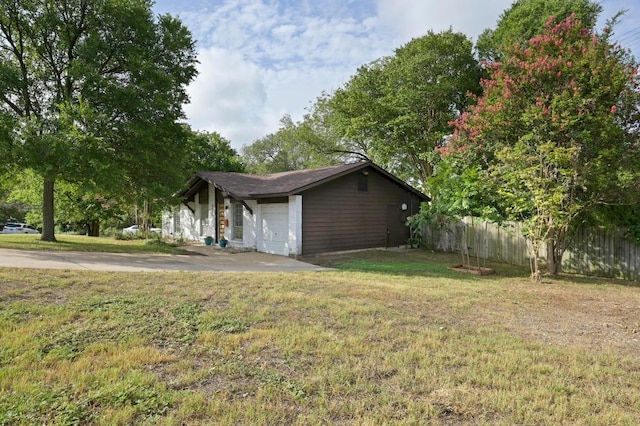 4800 Lansing Dr, Austin, TX 78745 - view of property exterior with an attached garage
