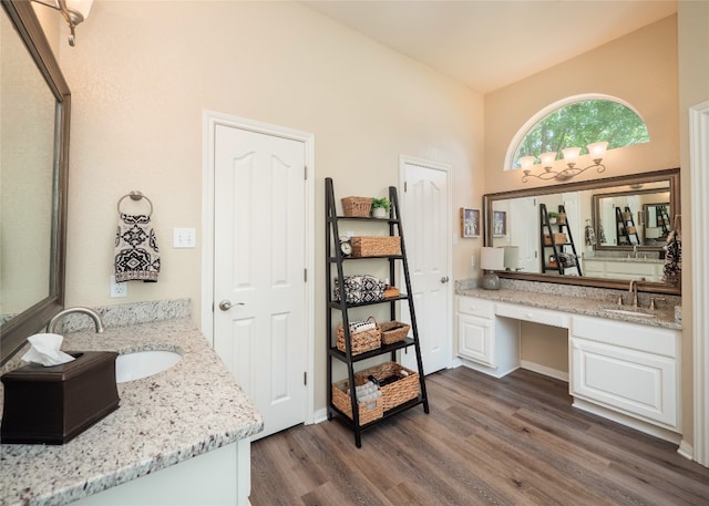 401 Kimra Cv, Georgetown, TX 78628 - full bath with wood finished floors and two vanities