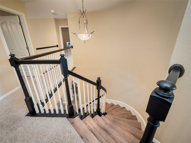 401 Kimra Cv, Georgetown, TX 78628 - stairs featuring baseboards and wood finished floors