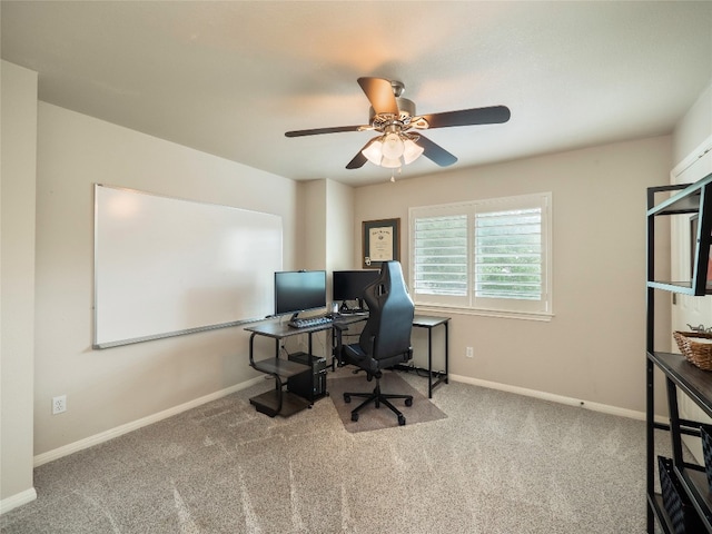 401 Kimra Cv, Georgetown, TX 78628 - carpeted home office with a ceiling fan and baseboards