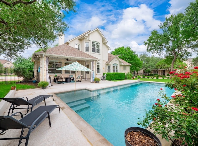 401 Kimra Cv, Georgetown, TX 78628 - view of swimming pool featuring a patio and ceiling fan