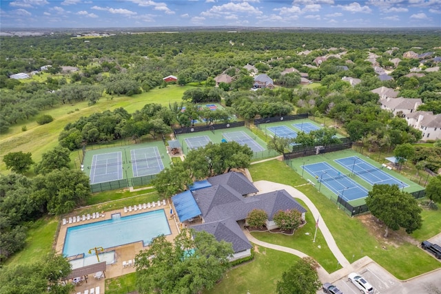 401 Kimra Cv, Georgetown, TX 78628 - bird's eye view of a pool area and a forest