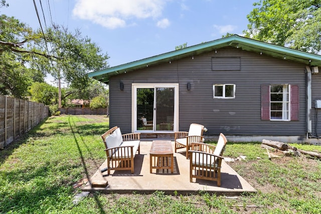 4911 Brighton Rd, Austin, TX 78745 - back of house featuring an outdoor hangout area and a patio