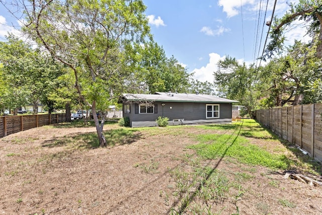 4911 Brighton Rd, Austin, TX 78745 - back of property featuring a fenced backyard