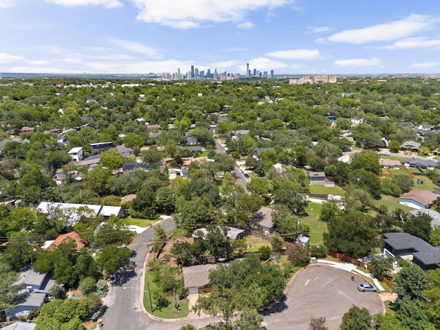 4911 Brighton Rd, Austin, TX 78745 - view of property location with city skyline and a tree filled landscape