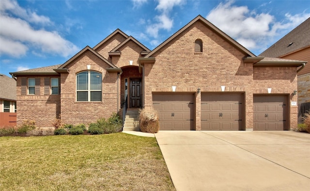 578 Ledge Stone Dr, Austin, TX 78737 - view of front facade with concrete driveway, brick siding, a front yard, and an attached garage