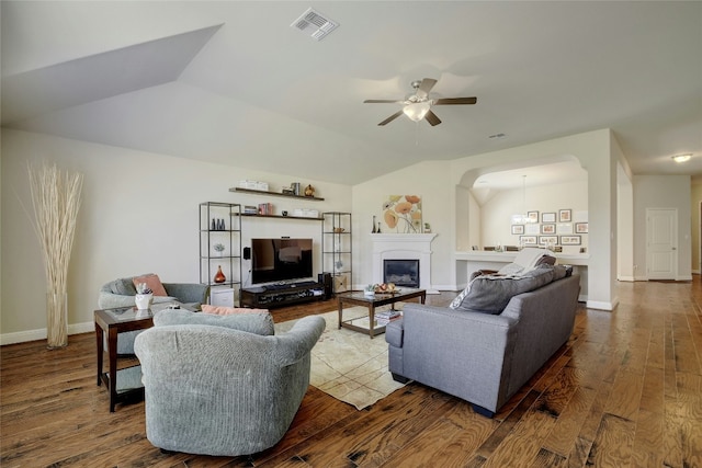 578 Ledge Stone Dr, Austin, TX 78737 - living area featuring dark wood-style floors, ceiling fan, a glass covered fireplace, and lofted ceiling