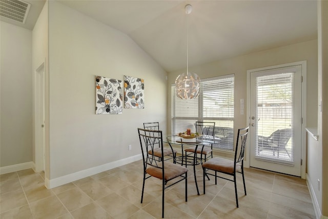 578 Ledge Stone Dr, Austin, TX 78737 - dining room featuring a chandelier, light tile patterned floors, and lofted ceiling