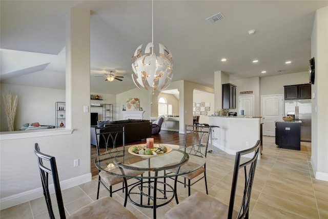578 Ledge Stone Dr, Austin, TX 78737 - dining area with a chandelier, light tile patterned floors, ceiling fan, recessed lighting, and arched walkways