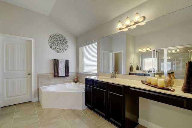 578 Ledge Stone Dr, Austin, TX 78737 - bathroom featuring a garden tub, tile patterned flooring, vanity, vaulted ceiling, and a shower stall