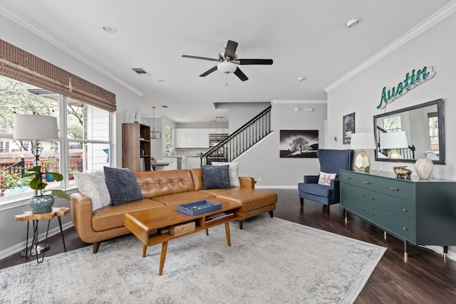 4112 Seldalia Trl, Austin, TX 78732 - living room featuring stairway, wood finished floors, a ceiling fan, plenty of natural light, and ornamental molding