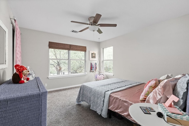 4112 Seldalia Trl, Austin, TX 78732 - carpeted bedroom featuring multiple windows and a ceiling fan