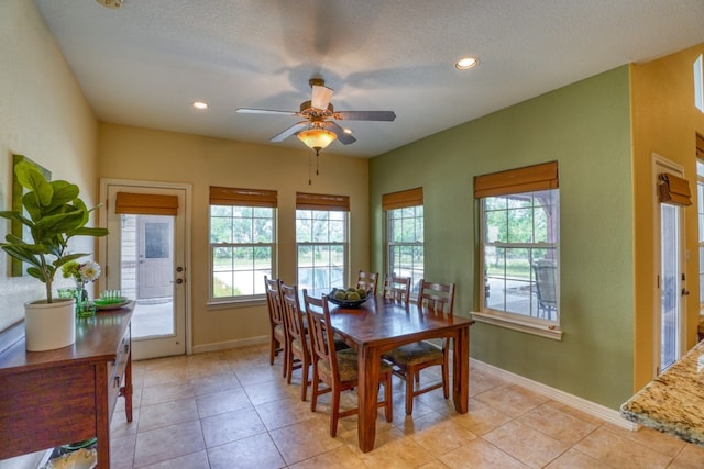 1050 Twisted Oak Dr, Horseshoe Bay, TX 78657 - dining area featuring plenty of natural light, ceiling fan, light tile patterned flooring, recessed lighting, and a textured ceiling