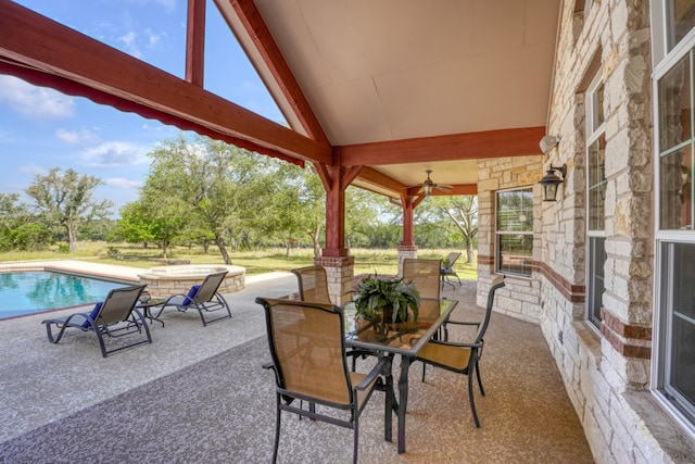 1050 Twisted Oak Dr, Horseshoe Bay, TX 78657 - view of patio featuring outdoor dining area, an outdoor pool, and a ceiling fan
