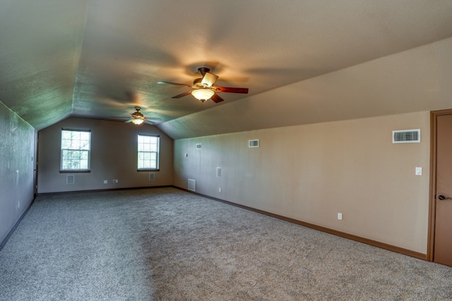 1050 Twisted Oak Dr, Horseshoe Bay, TX 78657 - additional living space featuring ceiling fan, vaulted ceiling, and carpet flooring