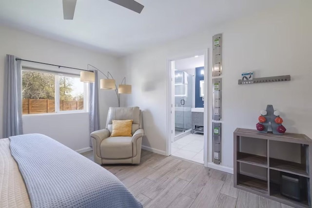 17708 Cherry Ln, Lago Vista, TX 78645 - bedroom with wood finished floors, ensuite bathroom, and ceiling fan