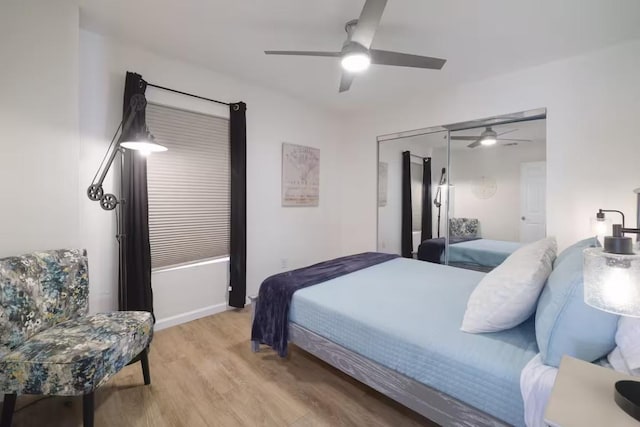 17708 Cherry Ln, Lago Vista, TX 78645 - bedroom with wood finished floors and a ceiling fan