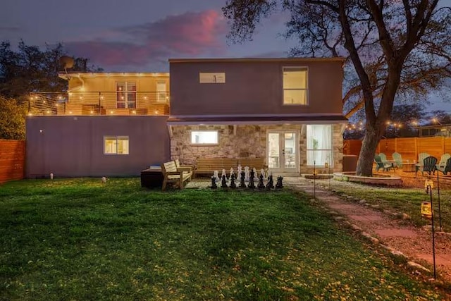 17708 Cherry Ln, Lago Vista, TX 78645 - back of house featuring french doors and stone siding