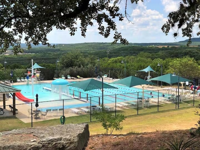 17708 Cherry Ln, Lago Vista, TX 78645 - community pool featuring a water play area