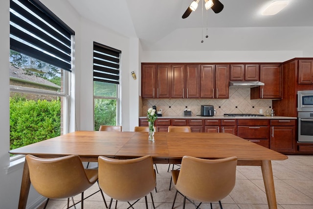 15800 Tetons Ct, Bee Cave, TX 78738 - kitchen with tasteful backsplash, stainless steel appliances, vaulted ceiling, light tile patterned floors, and ceiling fan