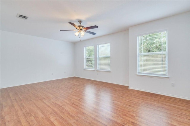 911 Bogart Rd, Cedar Park, TX 78613 - empty room with ceiling fan and light wood-type flooring
