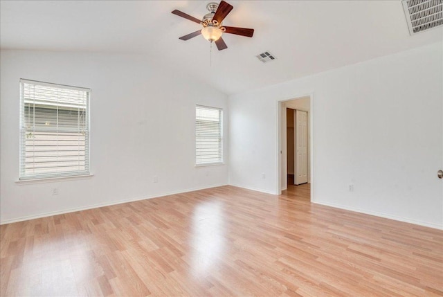 911 Bogart Rd, Cedar Park, TX 78613 - spare room with ceiling fan, light wood-style flooring, and vaulted ceiling