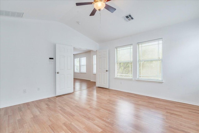 911 Bogart Rd, Cedar Park, TX 78613 - empty room featuring lofted ceiling, a ceiling fan, and light wood-style floors
