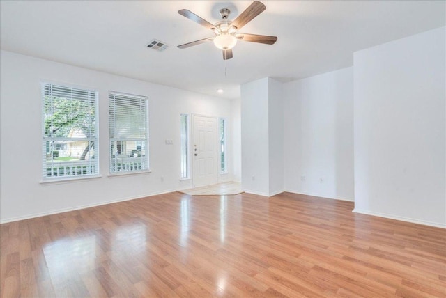911 Bogart Rd, Cedar Park, TX 78613 - spare room with ceiling fan and light wood-style flooring