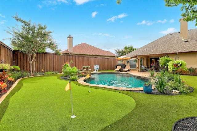 30613 Chi Chi Dr, Georgetown, TX 78628 - view of swimming pool featuring a putting area and a patio area