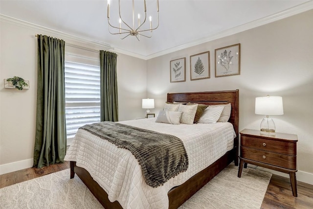 30613 Chi Chi Dr, Georgetown, TX 78628 - bedroom featuring a chandelier, wood finished floors, and ornamental molding
