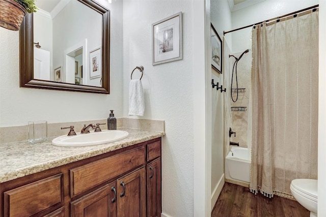 30613 Chi Chi Dr, Georgetown, TX 78628 - full bath with ornamental molding, vanity, shower / bath combo, and wood finished floors